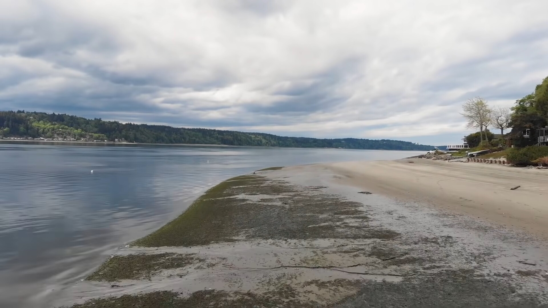 private beach with cloudy sky