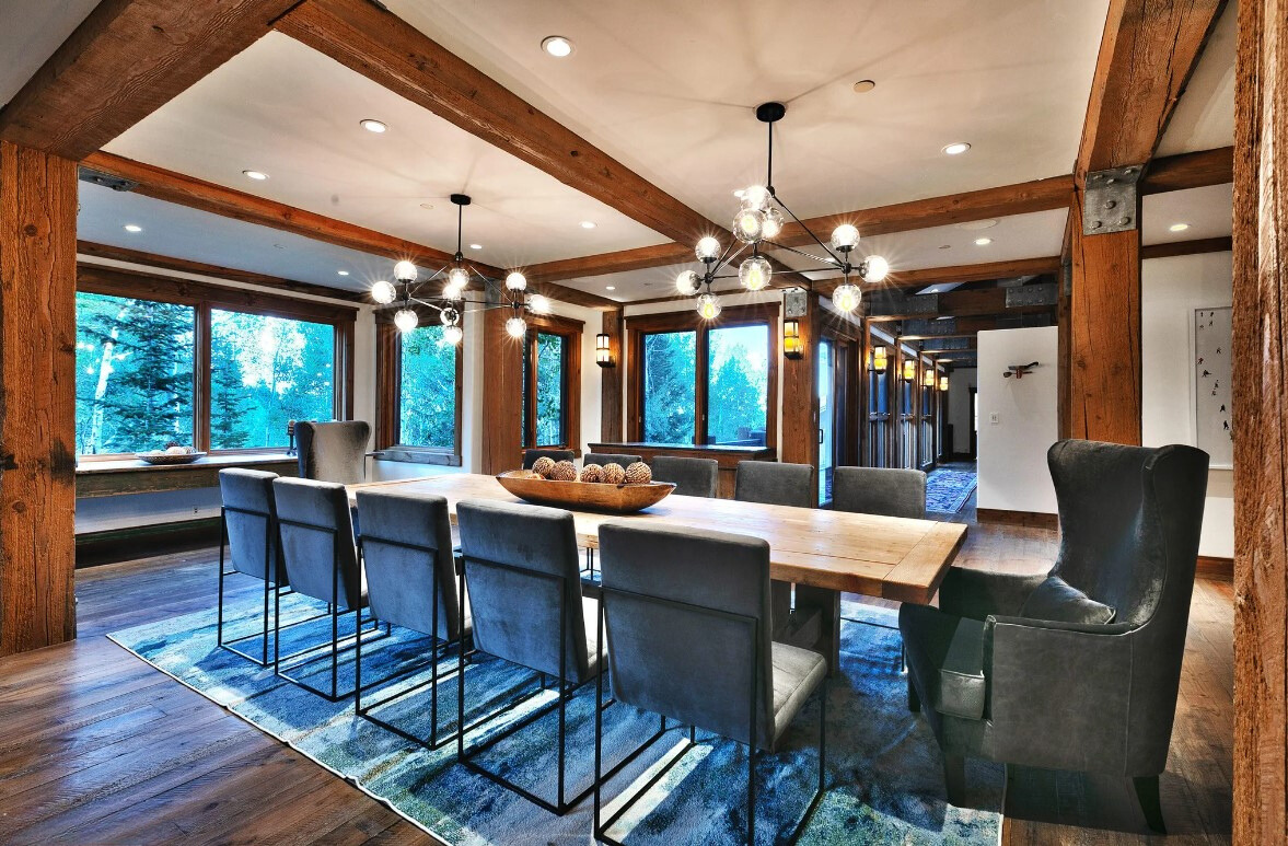 dining room with a dining table and black chairs