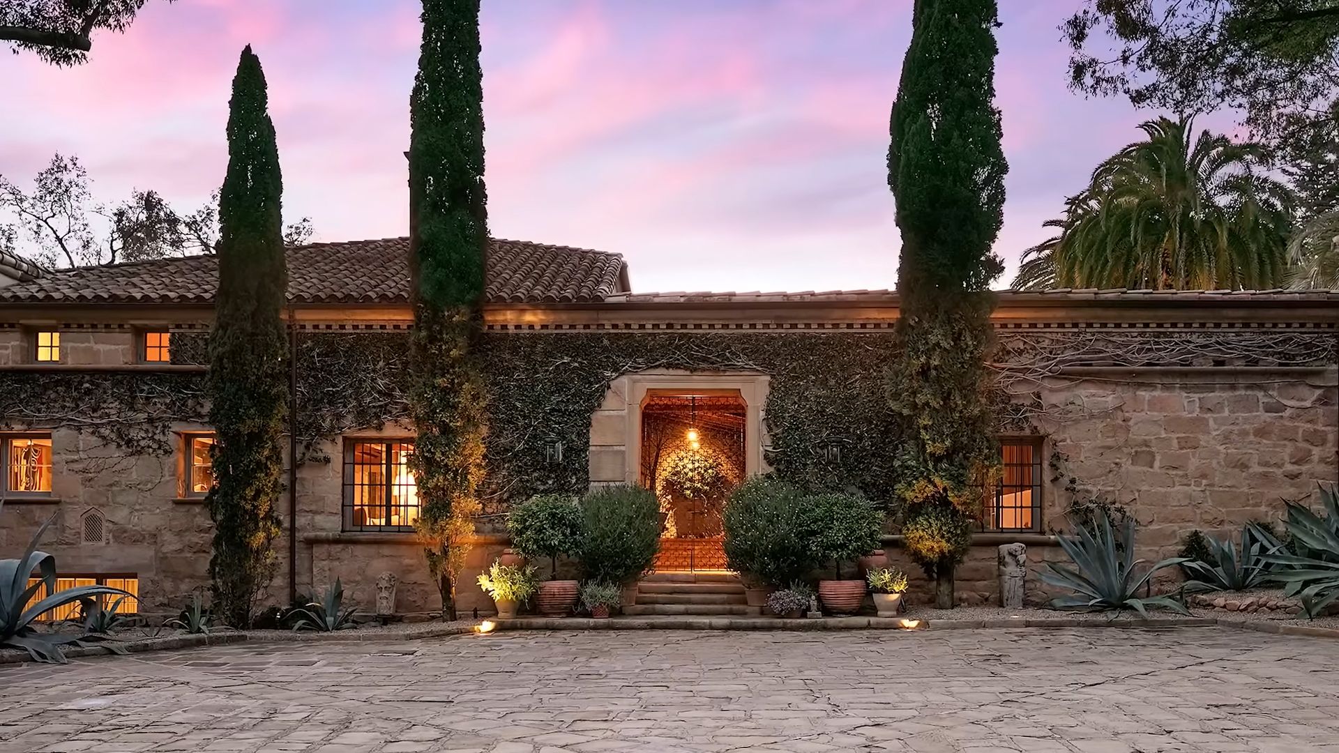 ellen degeneres house in chic italian style with lots of stone and terracotta