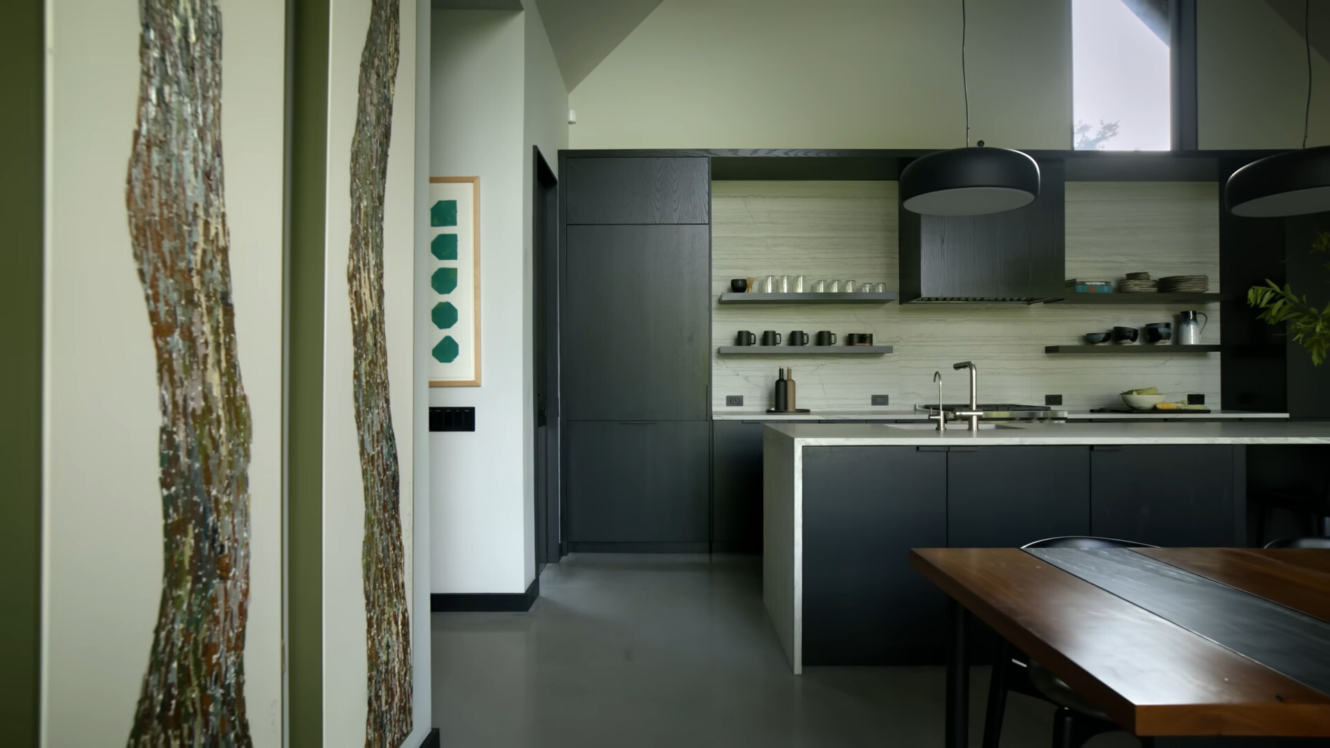 kitchen with black cabinets and a white countertop