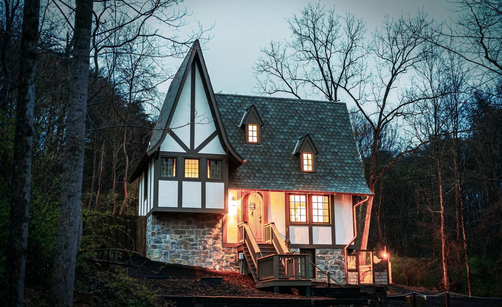 White magical cabin with stone base