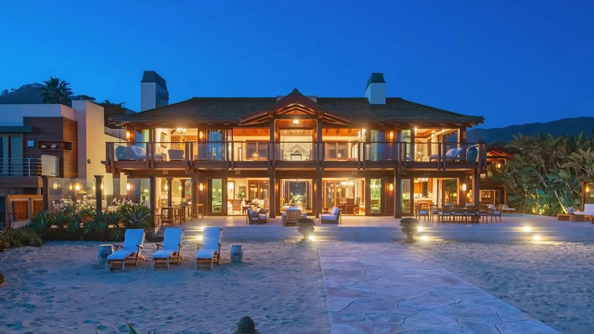 pierce brosnan mansion at night, lights up, house on the beach in malibu