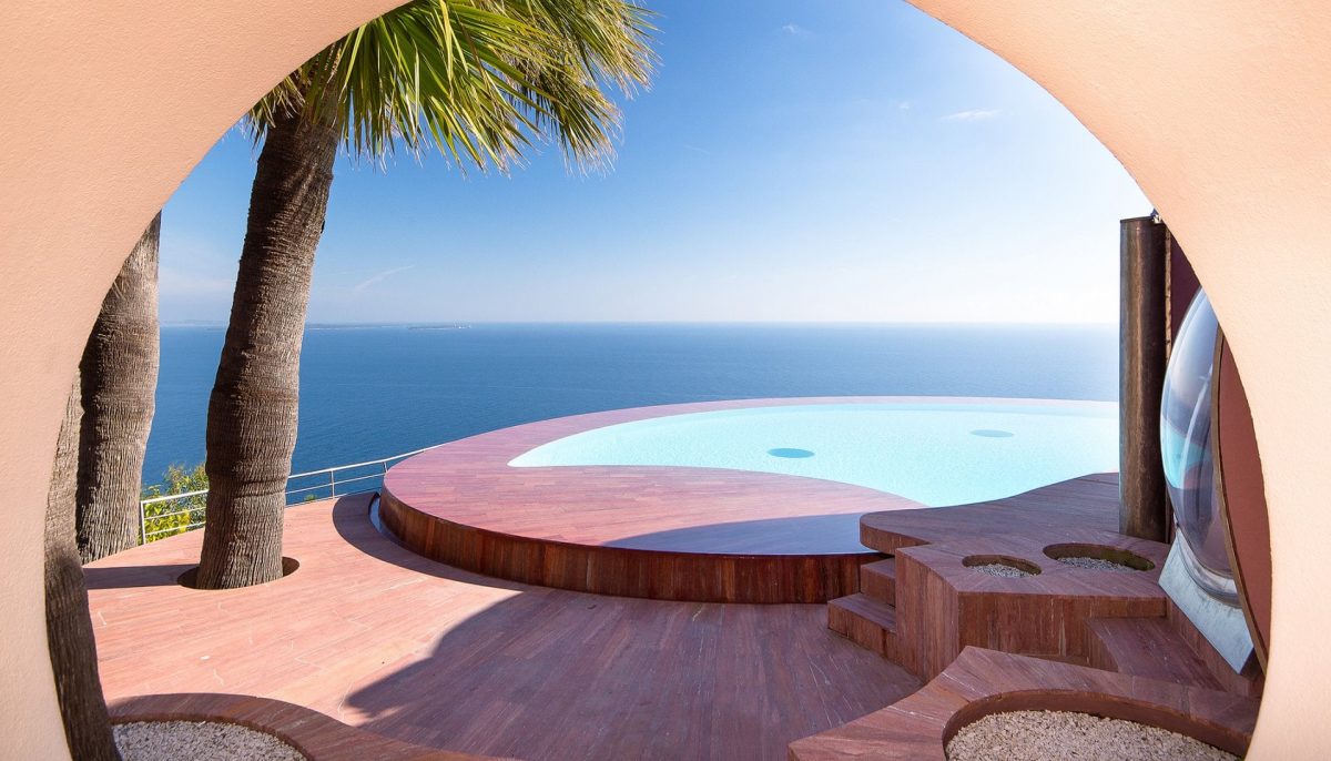 round pool with an ocean view