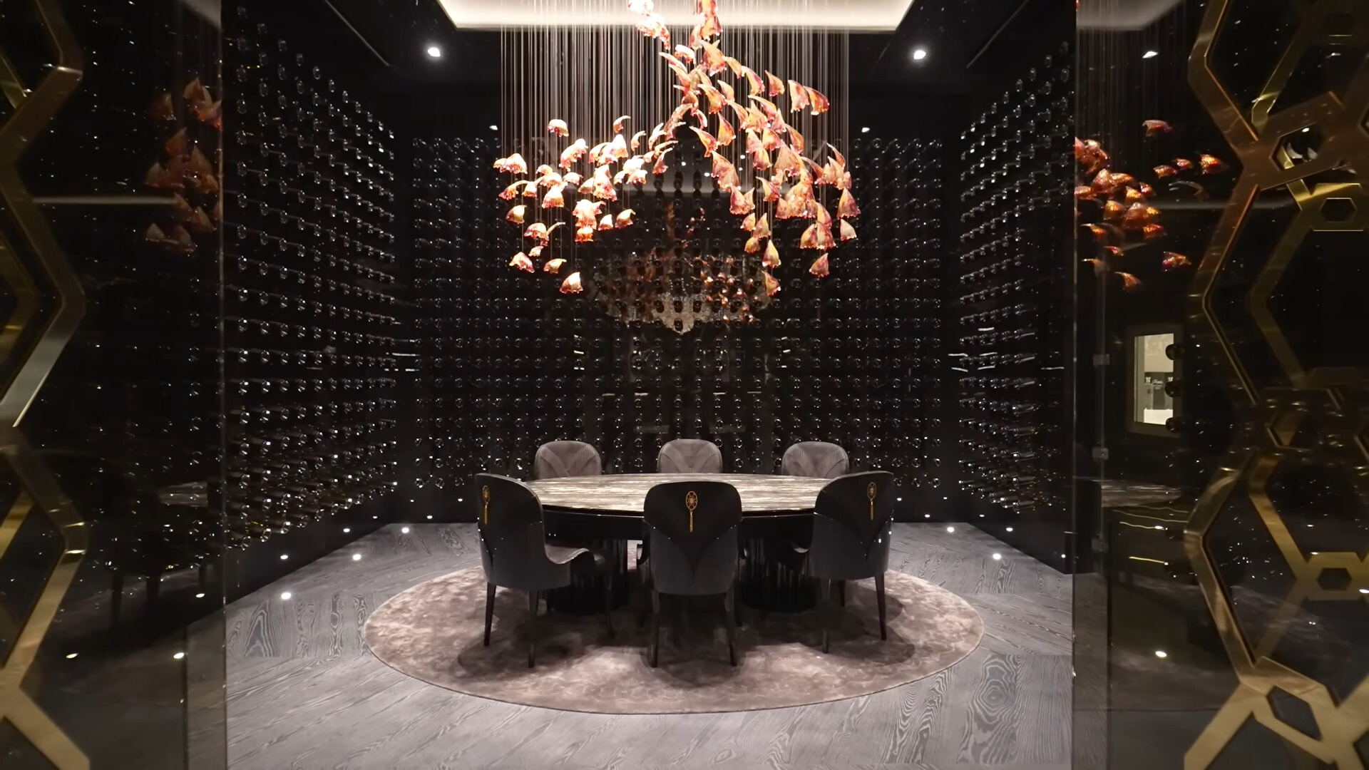 wine cellar with 1050 bottles and a beautiful murano glass chandelier