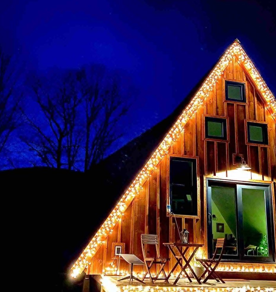 A-frame cabin with lights