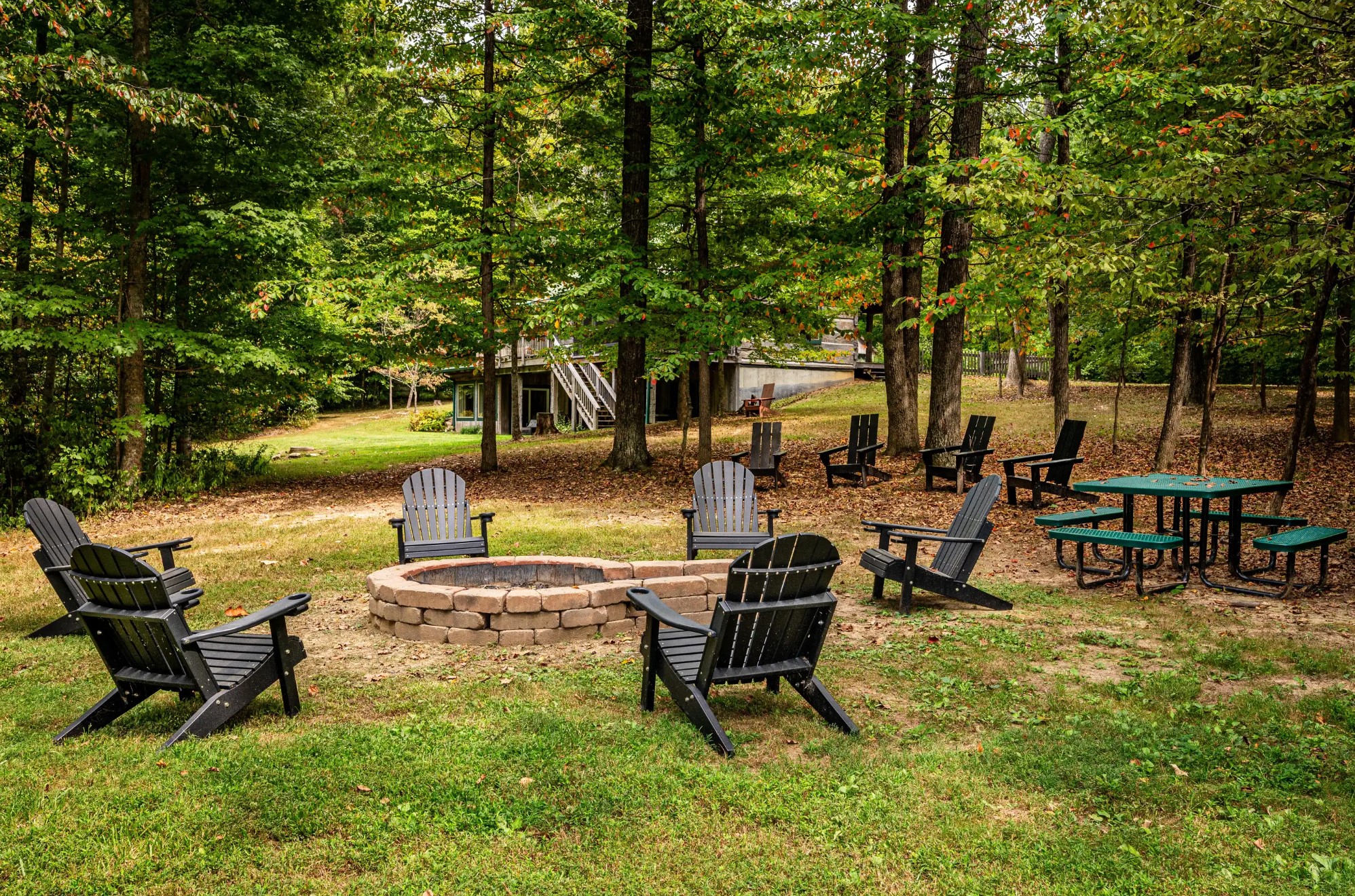 Fire pit in a cabin with comfortable chairs