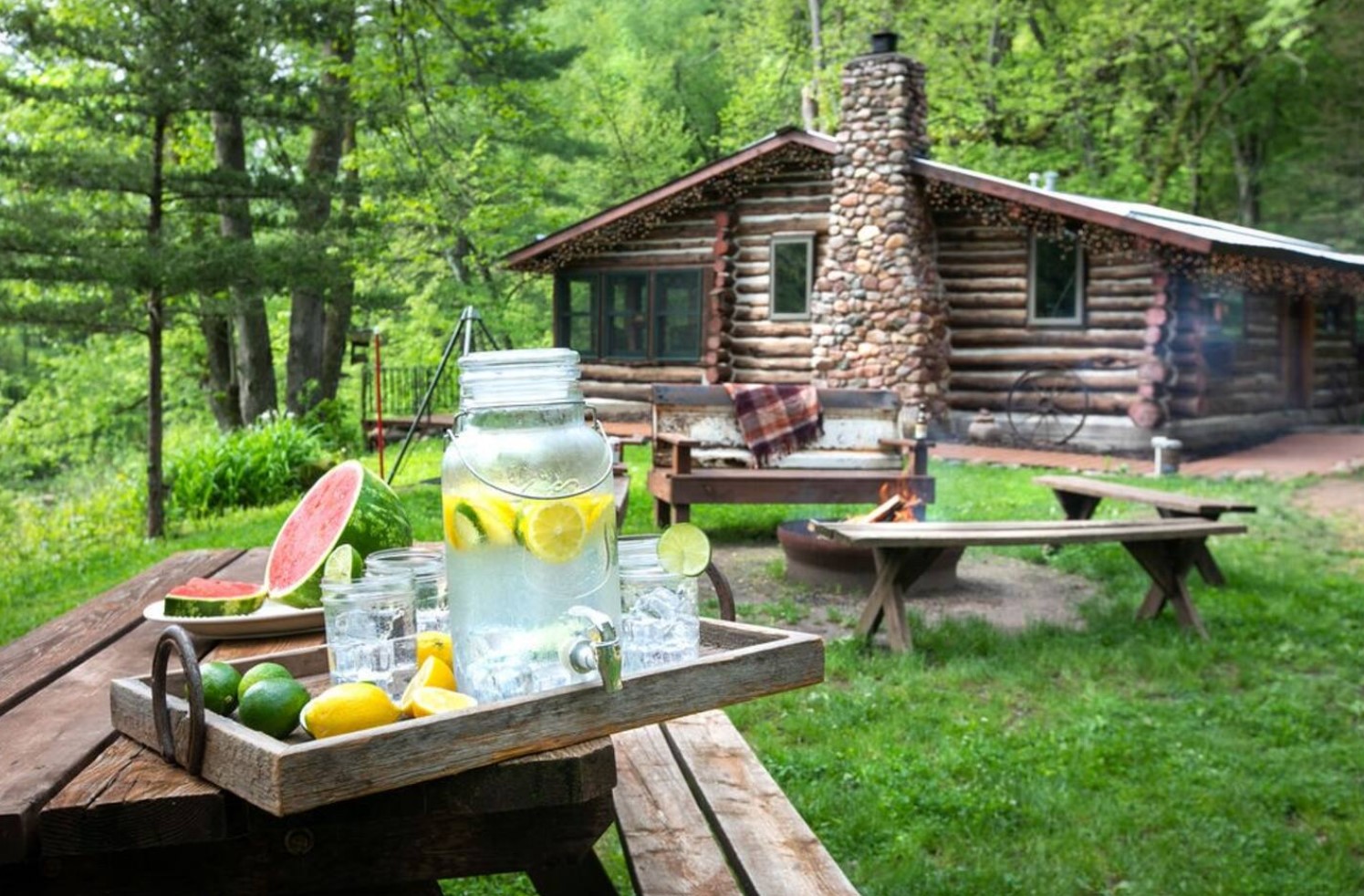 Cabin with a firepit and picnic table