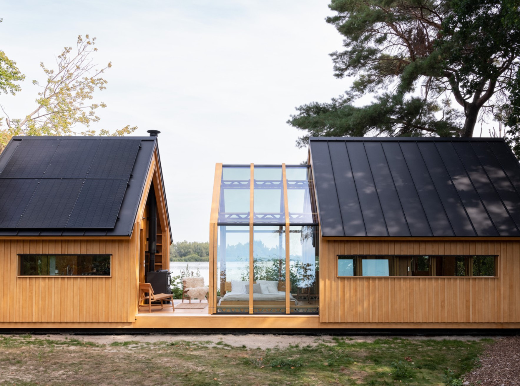 Tiny home with a glass middle part that opens up