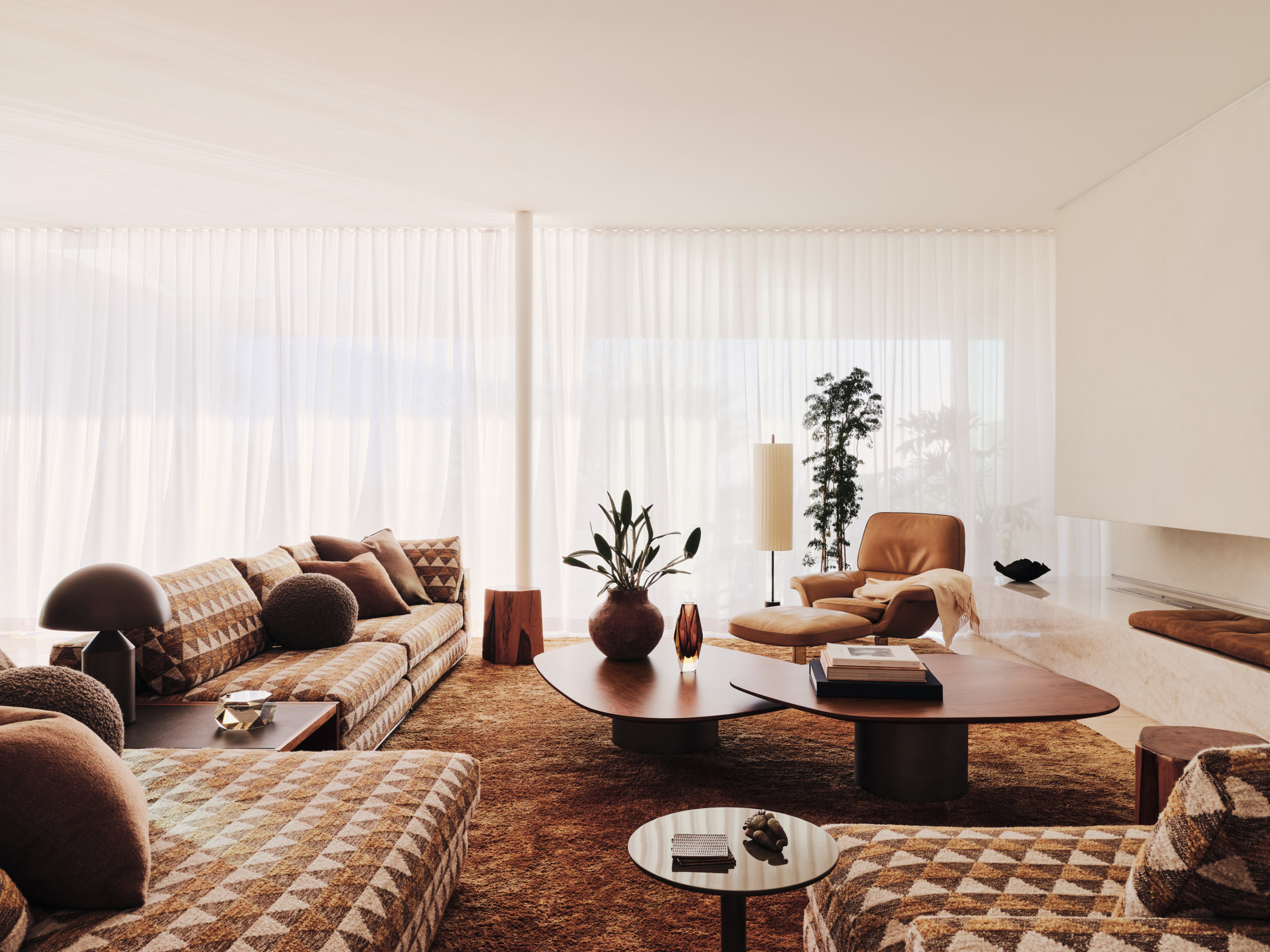 Retro living room with wooden tables and a colorful couch