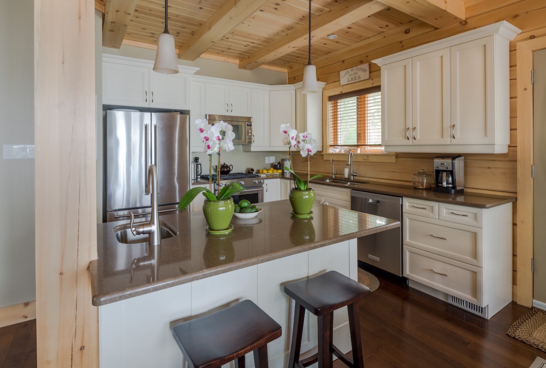 Modern kitchen with sleek design and full-sized appliances