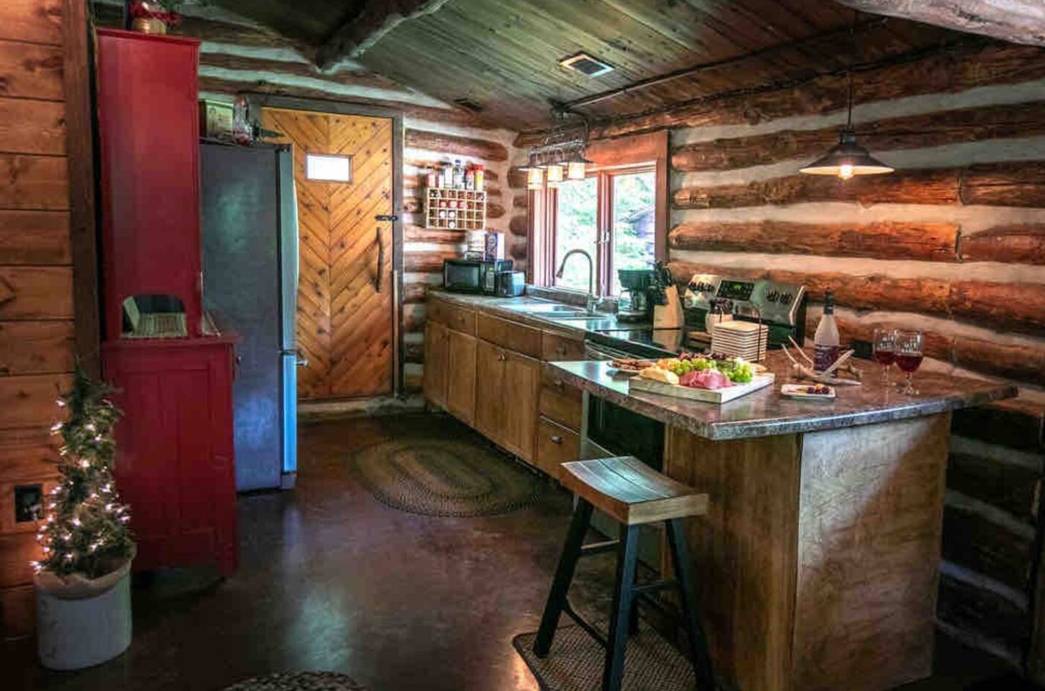 Spacious kitchen in cabin with L-shaped countertop