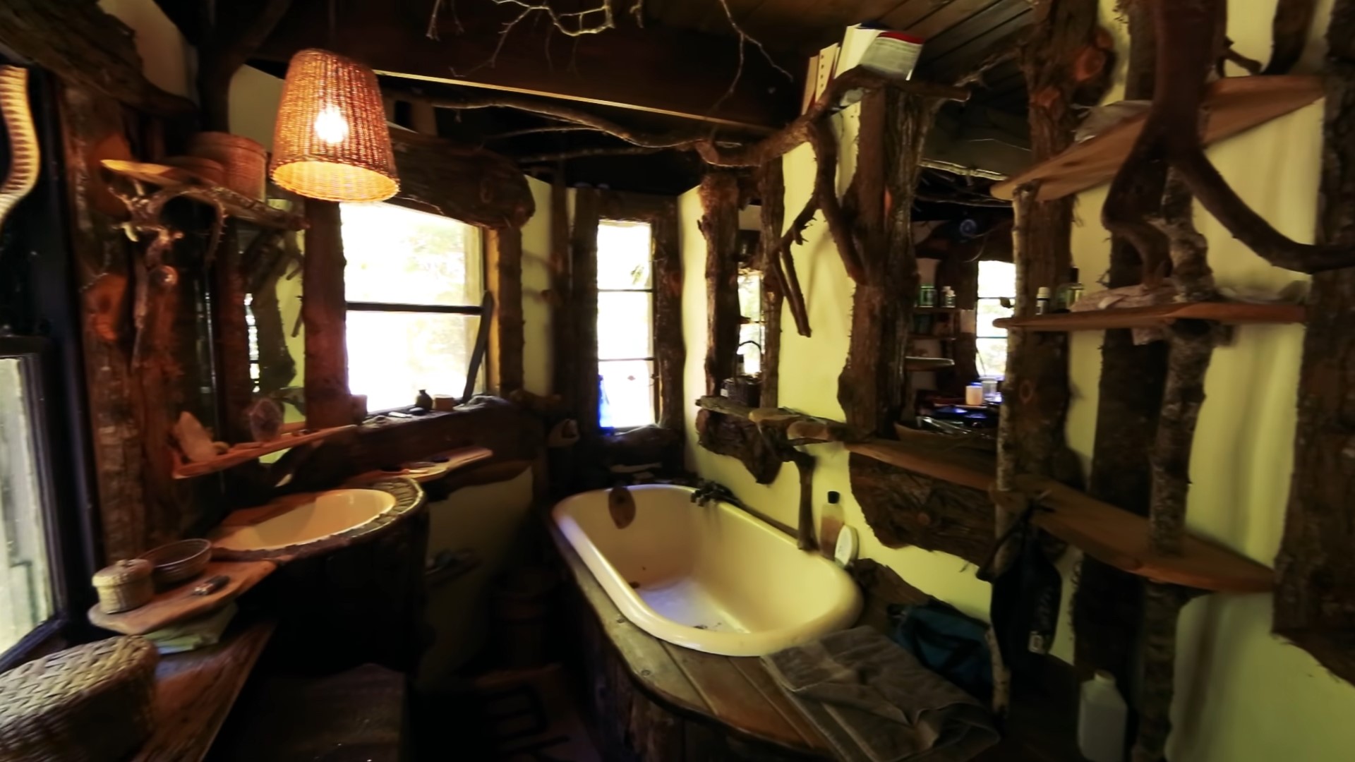 Bathroom with wooden details and a sunken bathtub