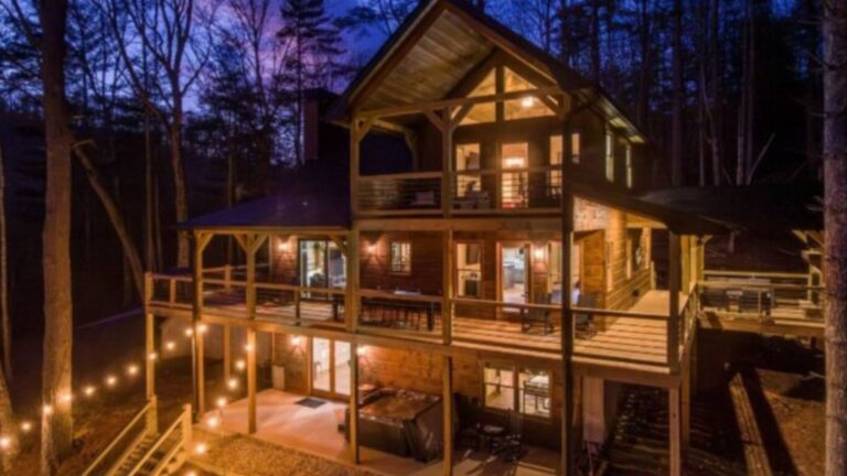 exterior of a log cabin in the woods of cherry log