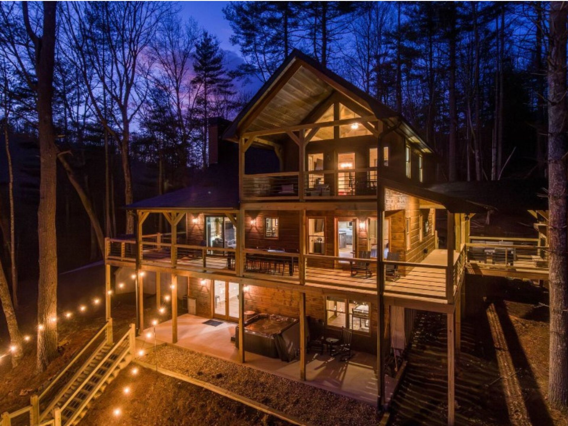 exterior of a log cabin in the woods of cherry log