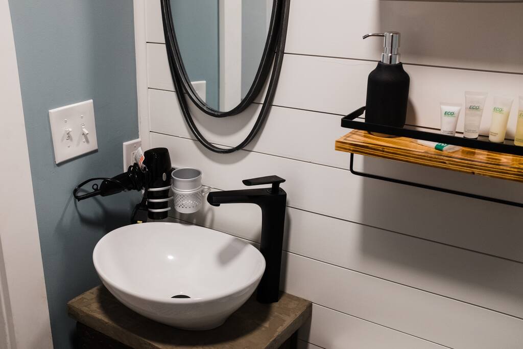 Adorable bathroom with a sink and a mirror