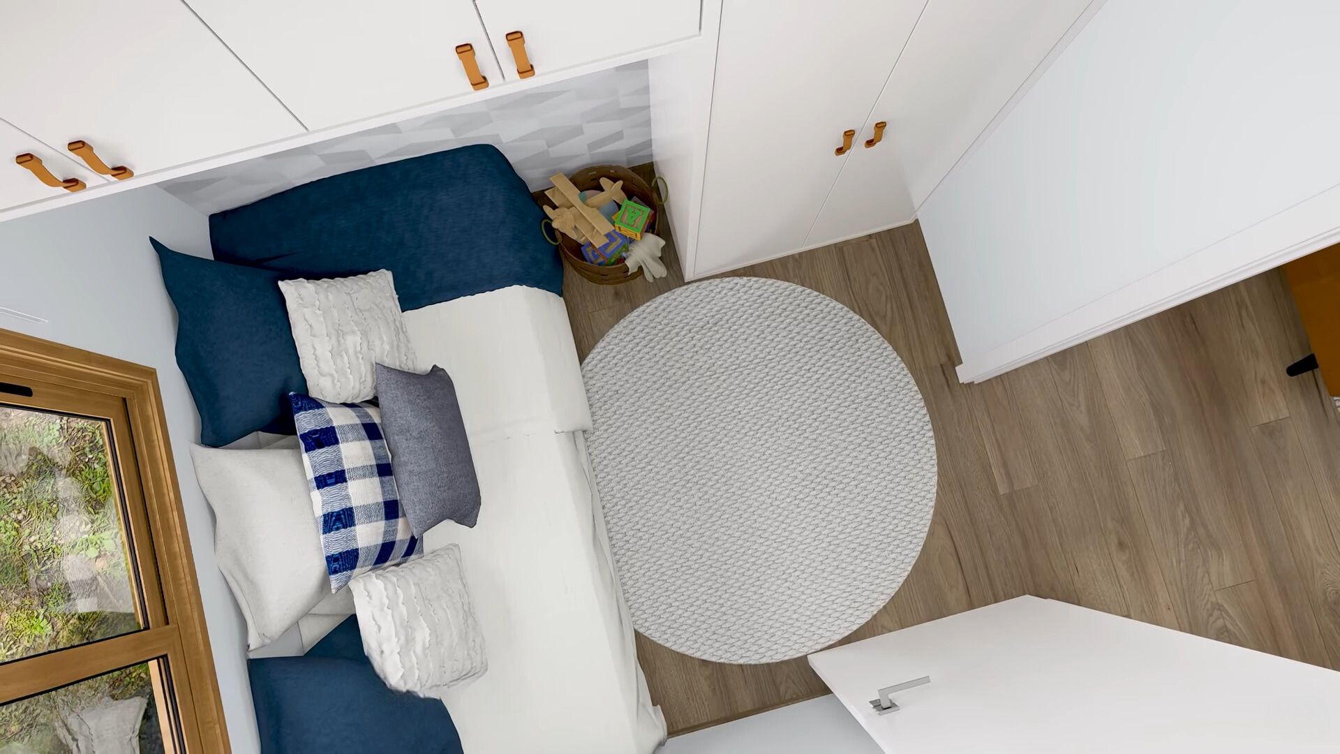 bedroom with a window next to the bed and blue and white bed sheets with lots of pillows and a blue closet