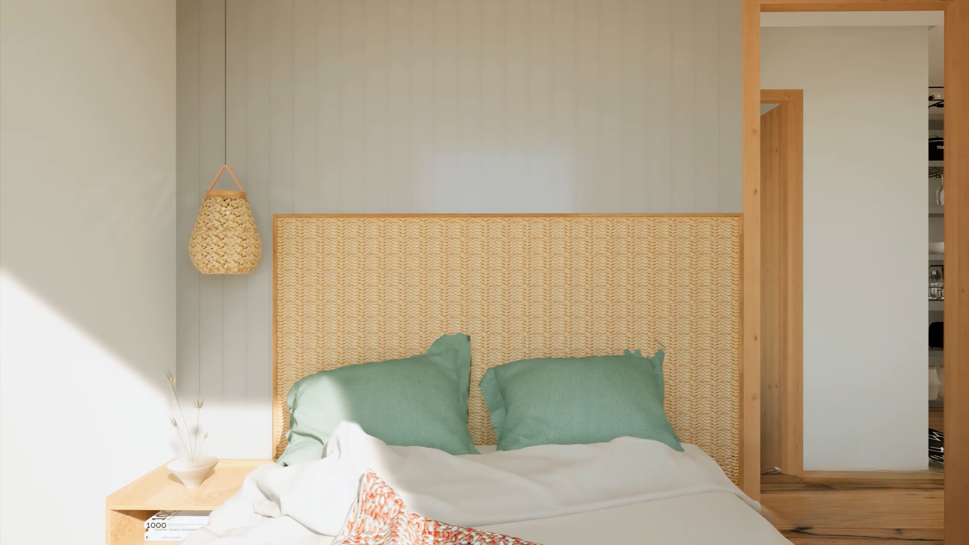 bedroom with green pillows, a low hanging lamp and a brown bedside table