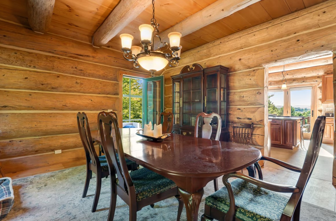 dining area with a long brown dining table and chairs