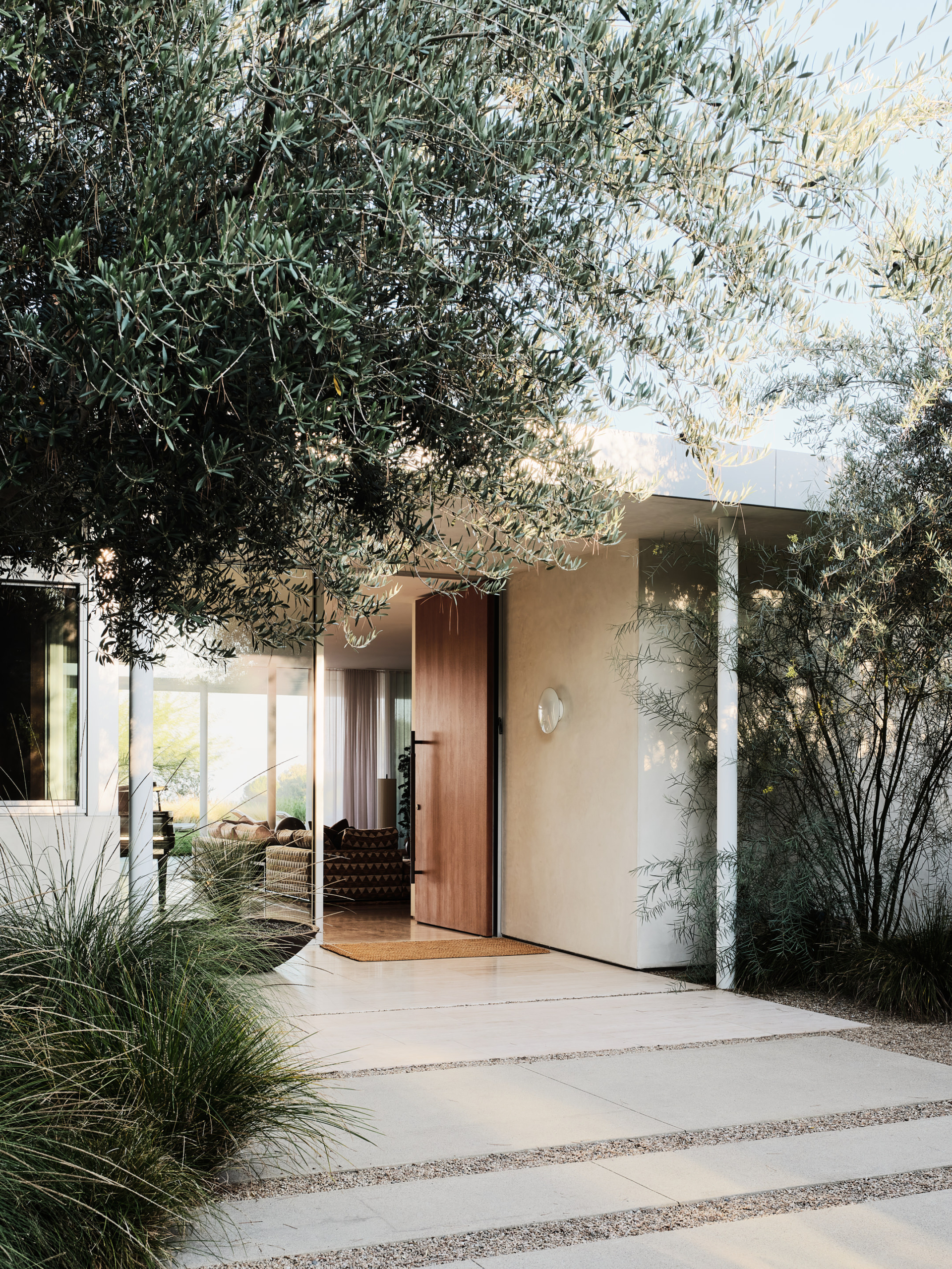 Entrance to a home with a big wooden door