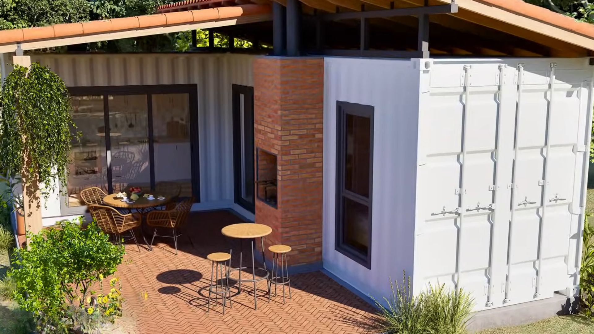 exterior of the container house with a nice patio, seating zones and a grill made of red bricks