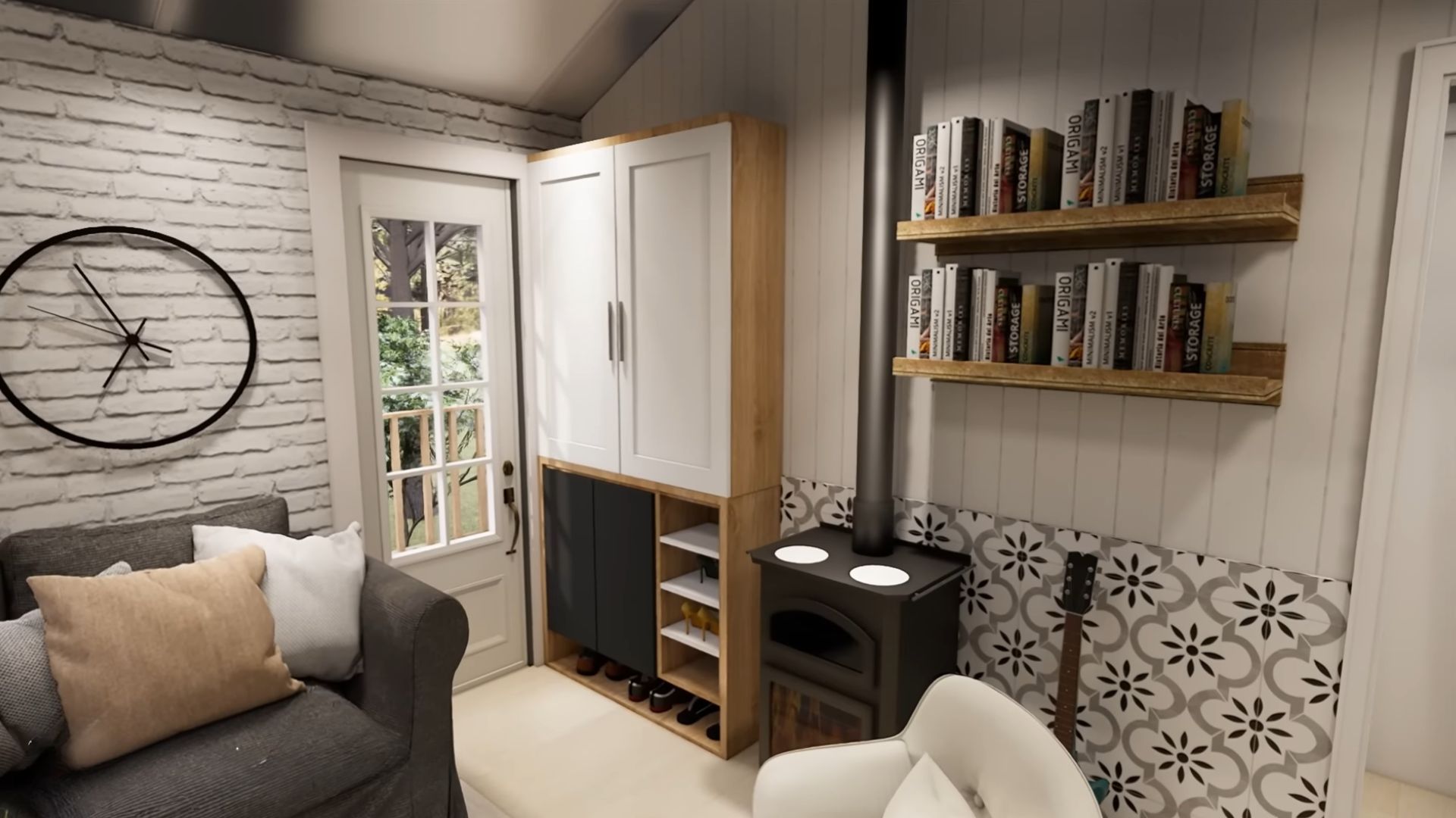 fireplace with interesting tiles behind it, a small library on the shelves next to it, a grey loveseat on the left with a big round clock on the wall