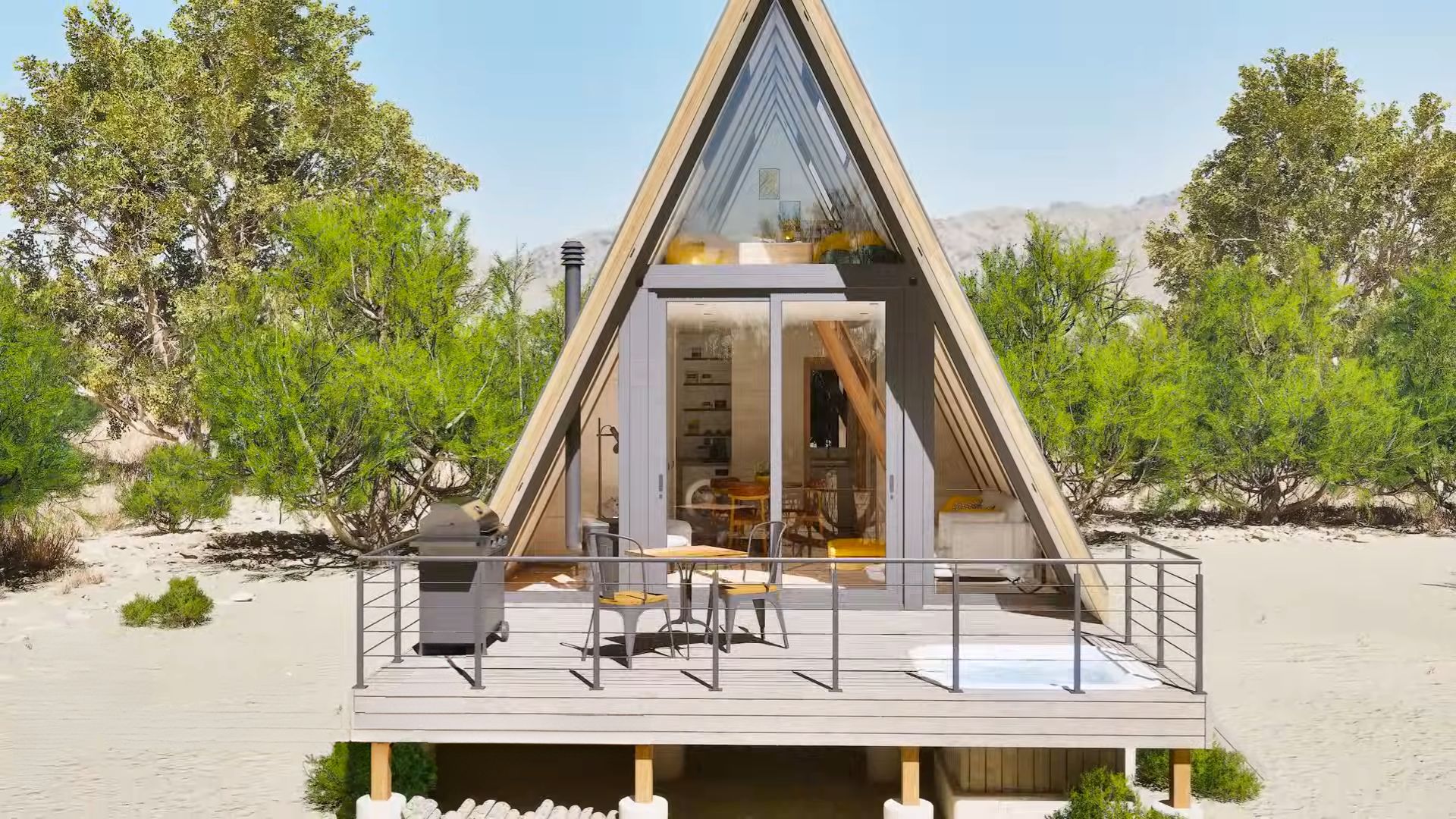 frontal view of the a-frame container house with the entire entrance in glass, a small deck with a grill and chairs, and a hot tub