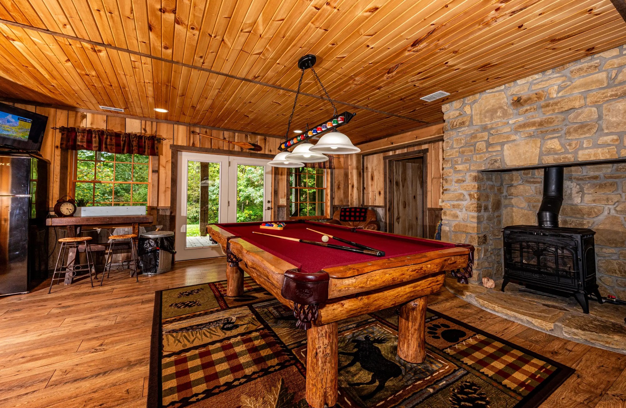 Game room in cabin with pool table