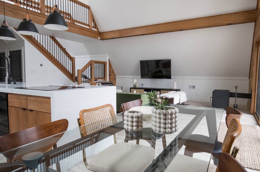 glass dining table and brown chairs