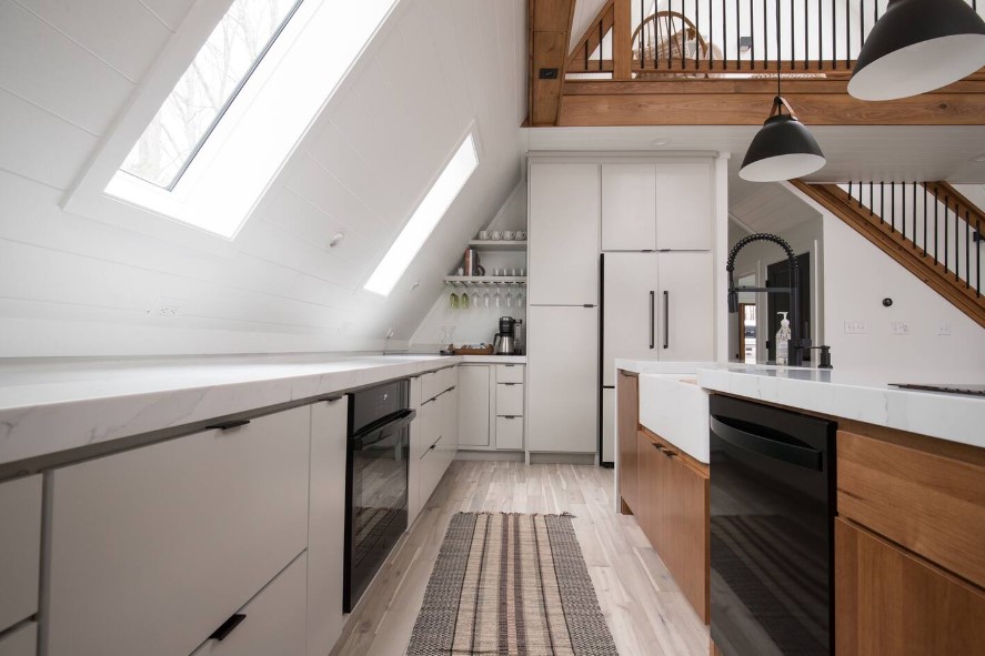 kitchen with brown and white cabinets and white countertops