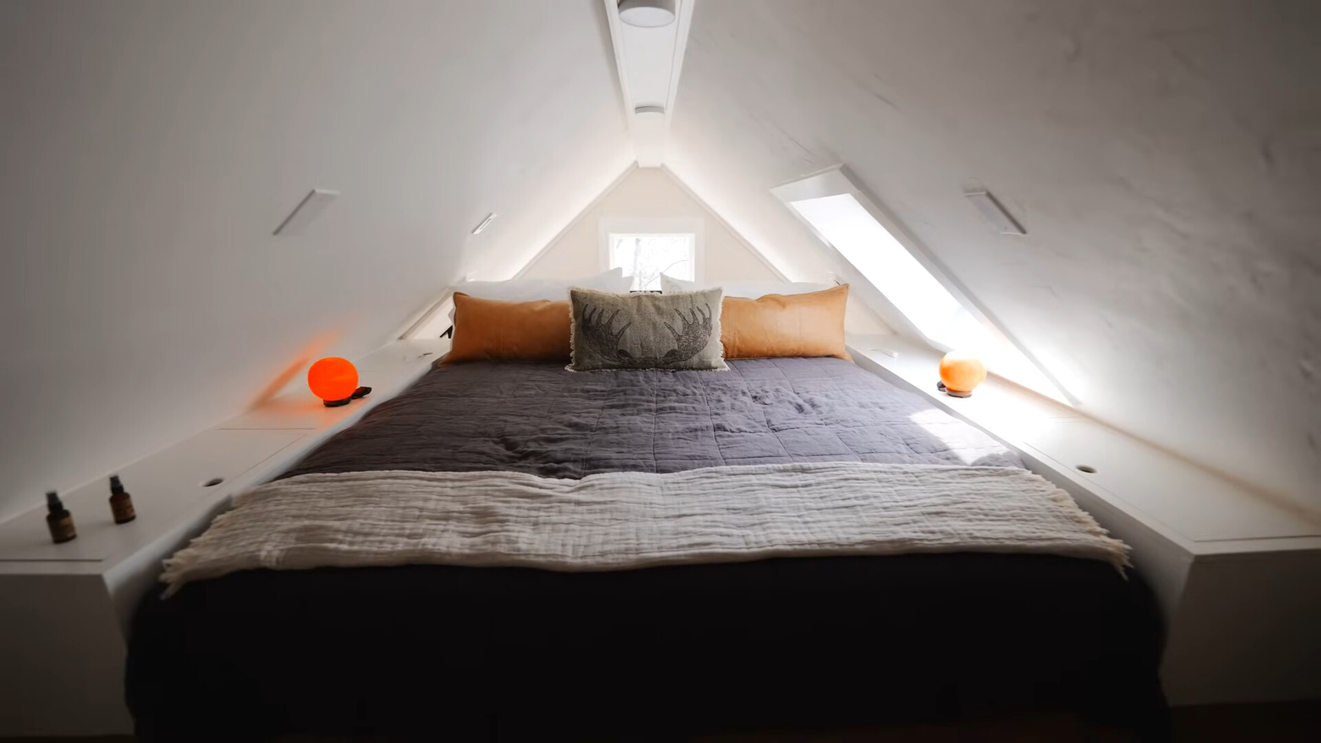 loft bedroom with a window