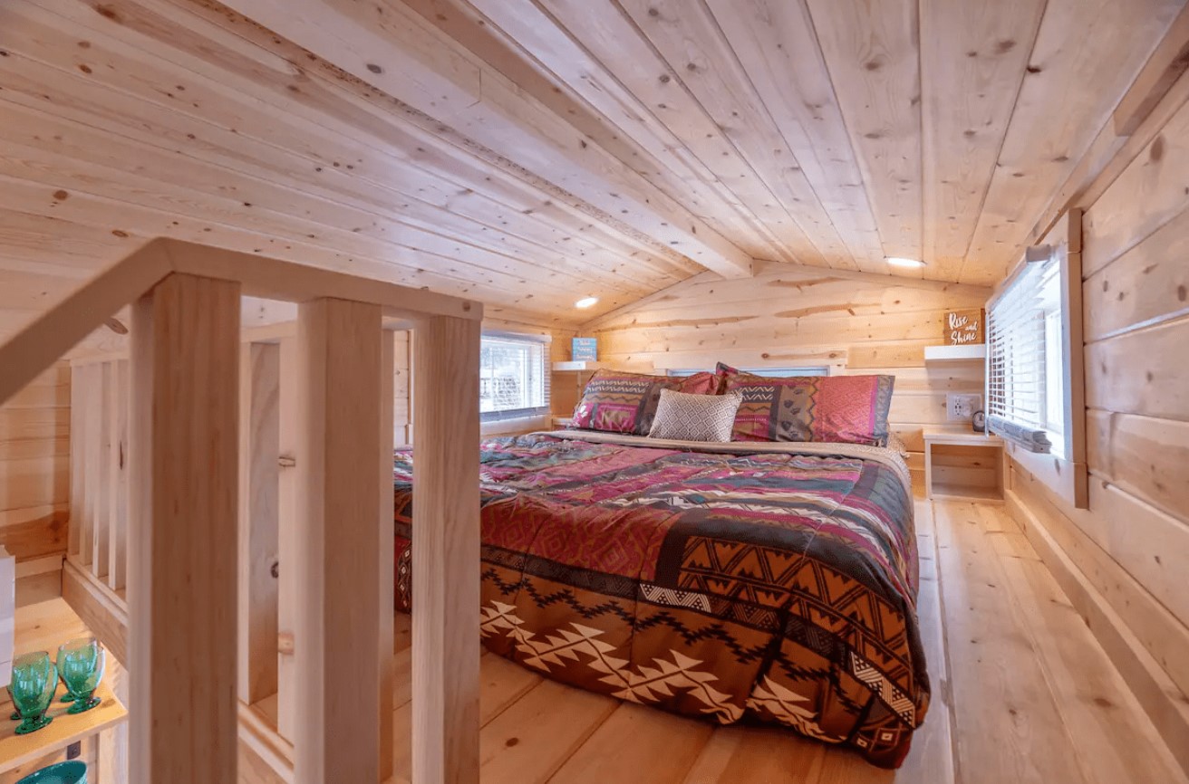 loft bedroom with a queen sized bed