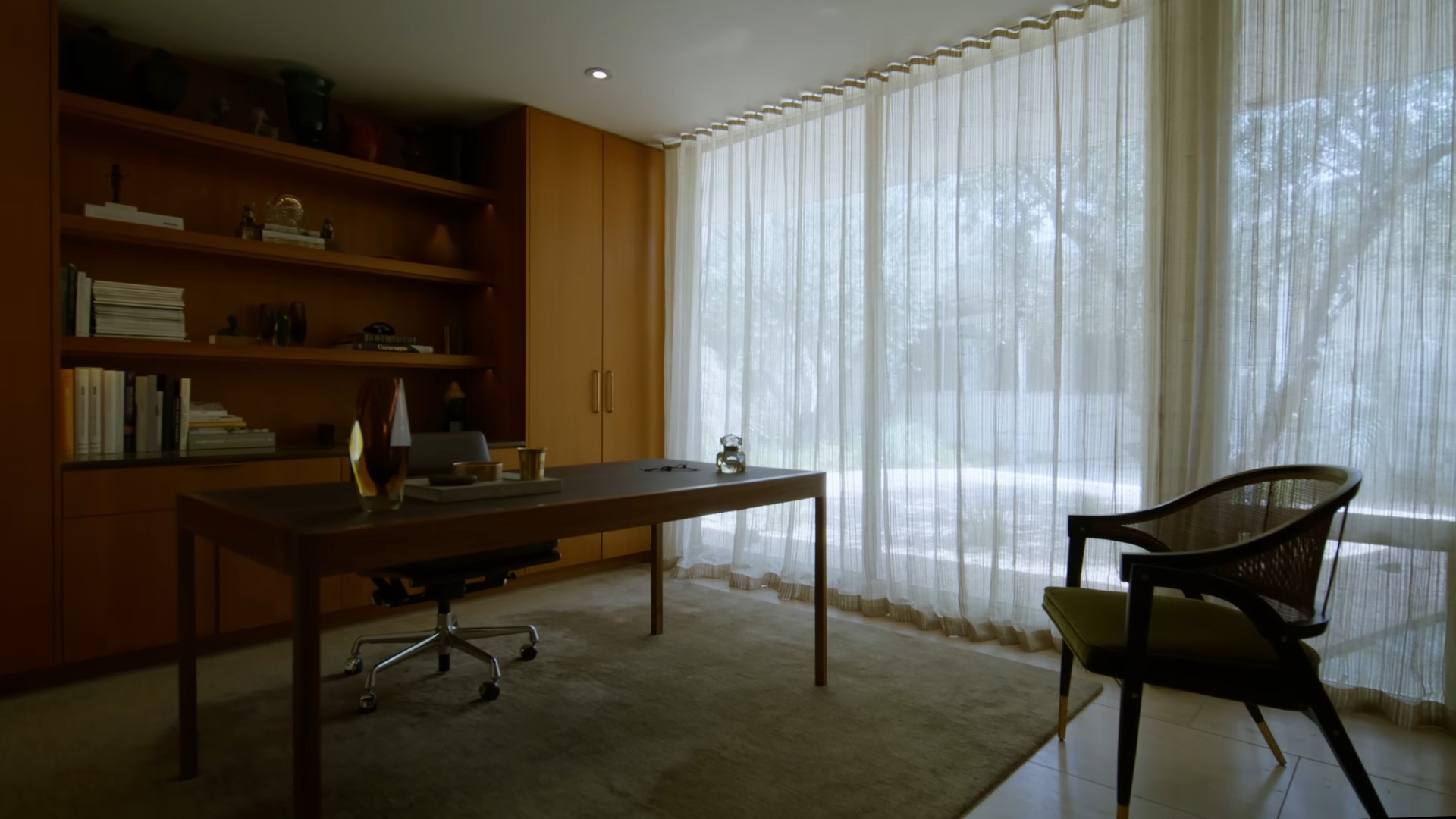 Retro study with huge windows and wooden desk