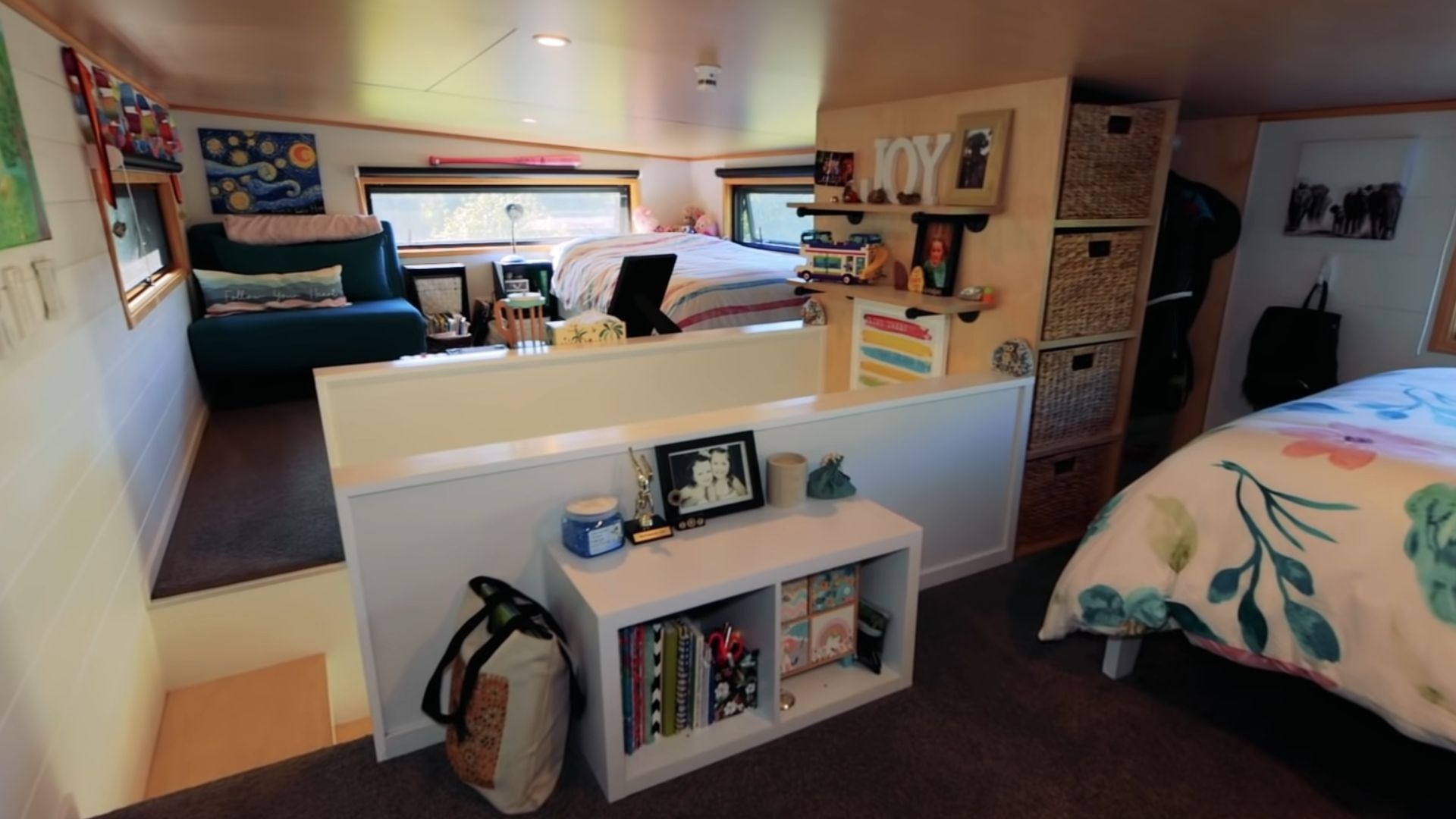 girls' bedroom with beds in corners, guest beds, areas with lots of toys