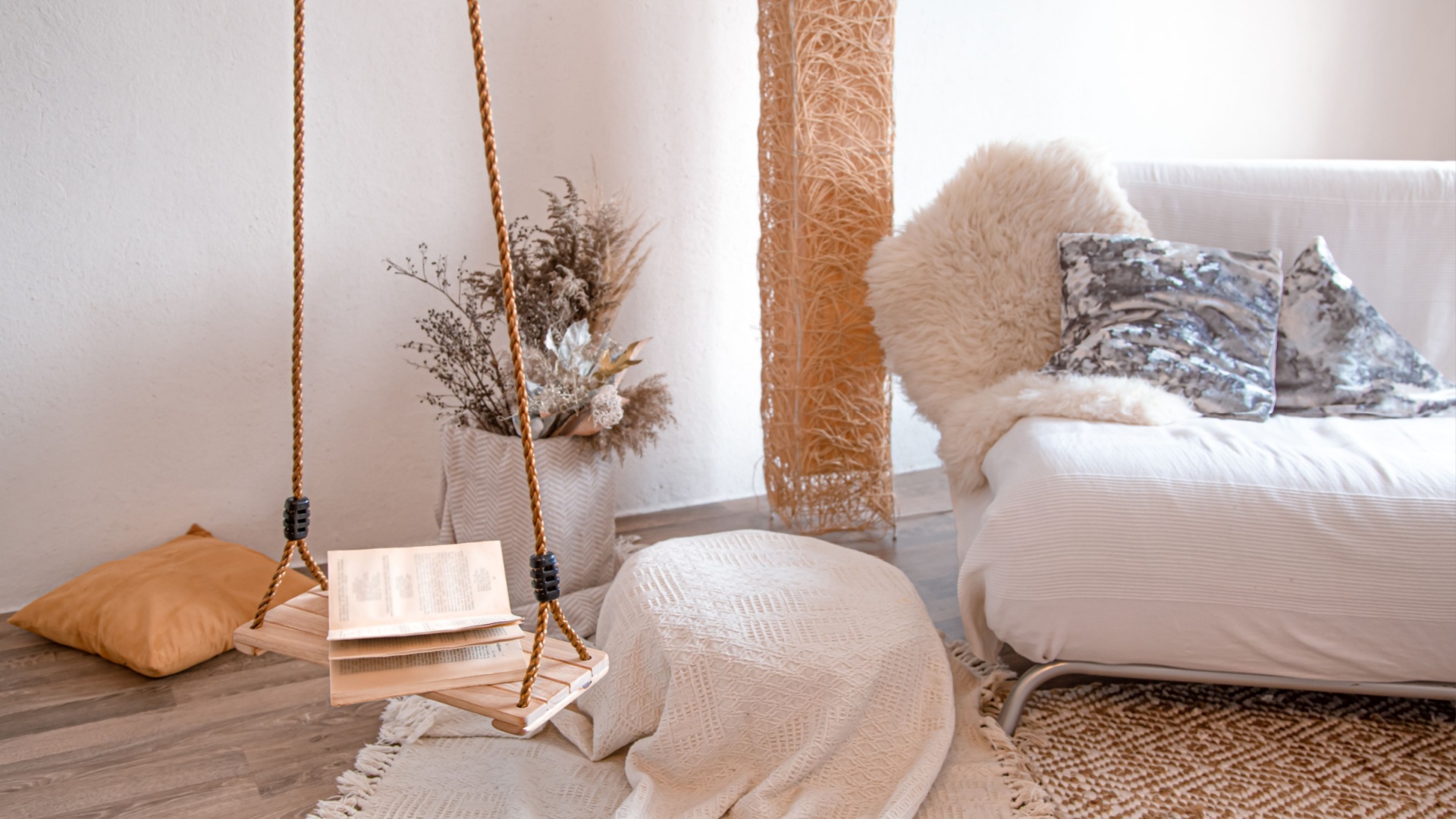 shabby chic living room in beige with an old-fashioned swing