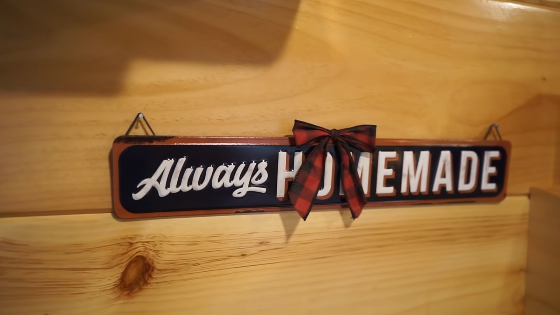 sign that says always homemade with a little bow