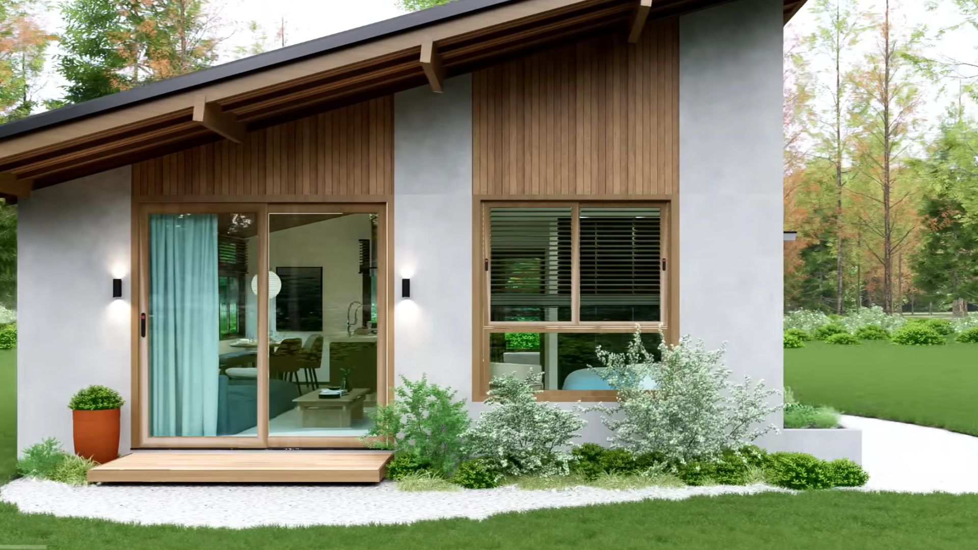 beautiful back side of the house with lots of greenery