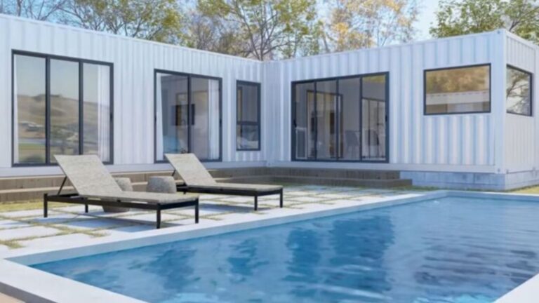 L-shaped container house with lots of picture windows and doors, two lounge chairs and a nice big pool