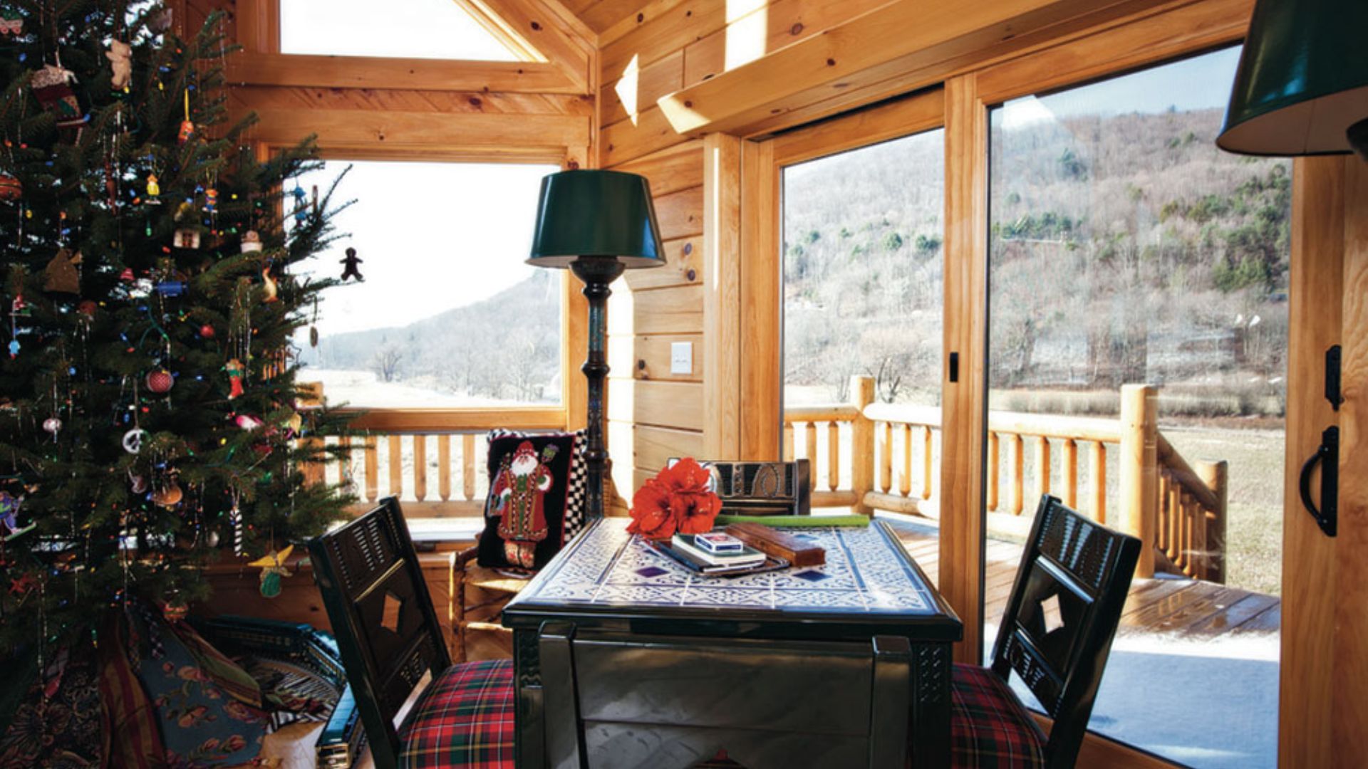 dining table by the christmas tree and panoramic windows