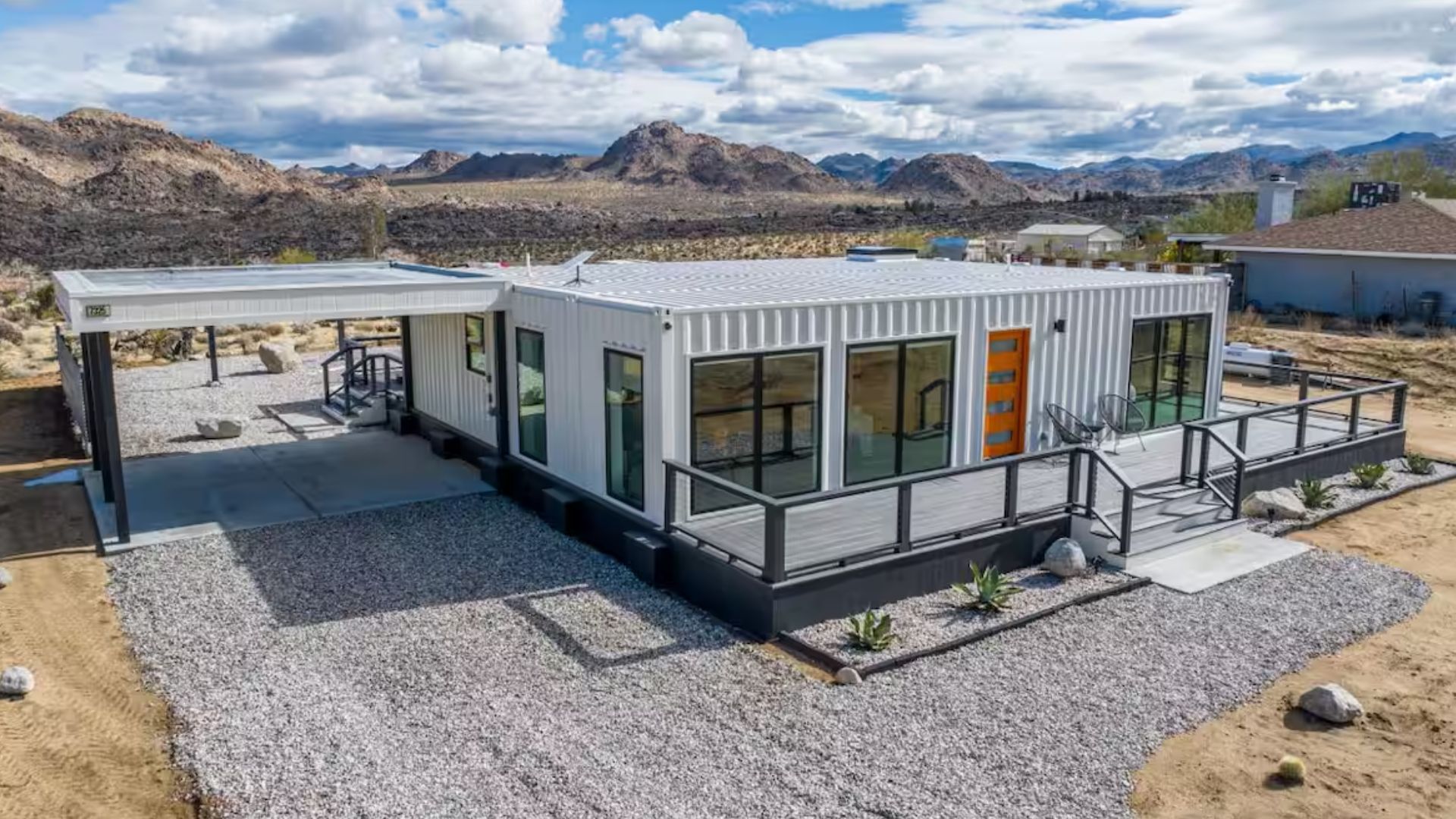 exterior of a shipping container house in the desert