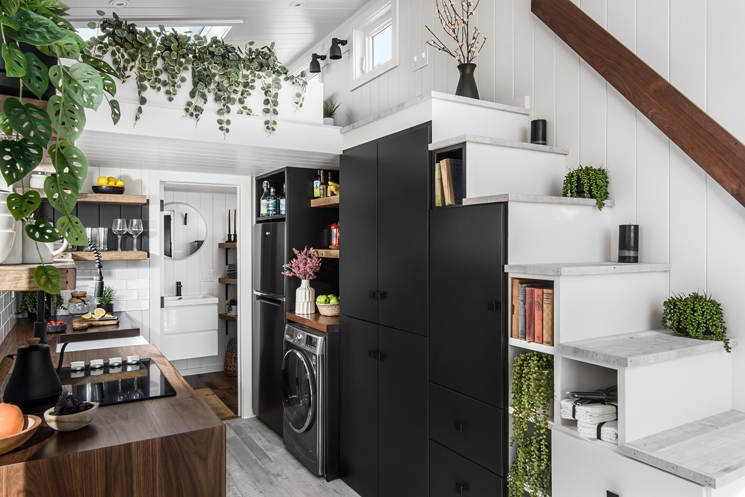 Functional storage area underneath the stairs with cabinets