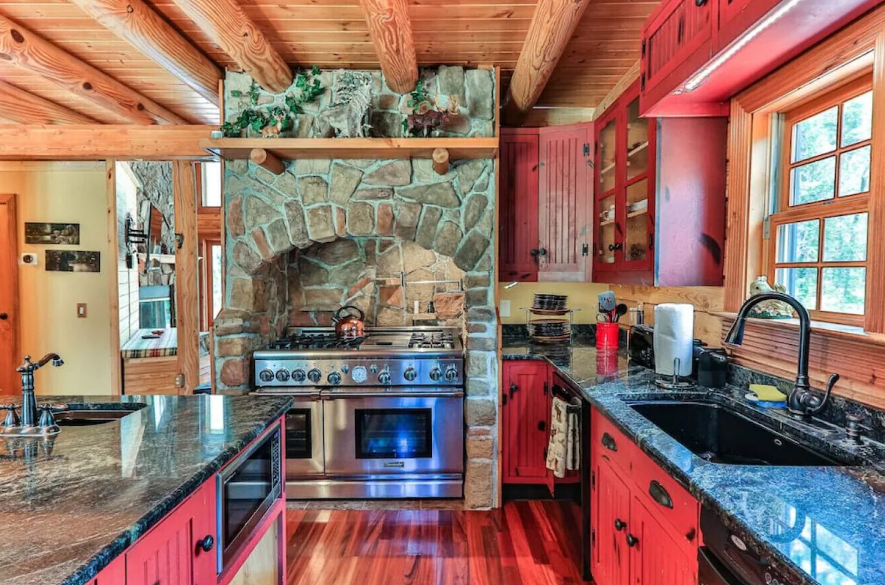 Red kitchen with framed stove