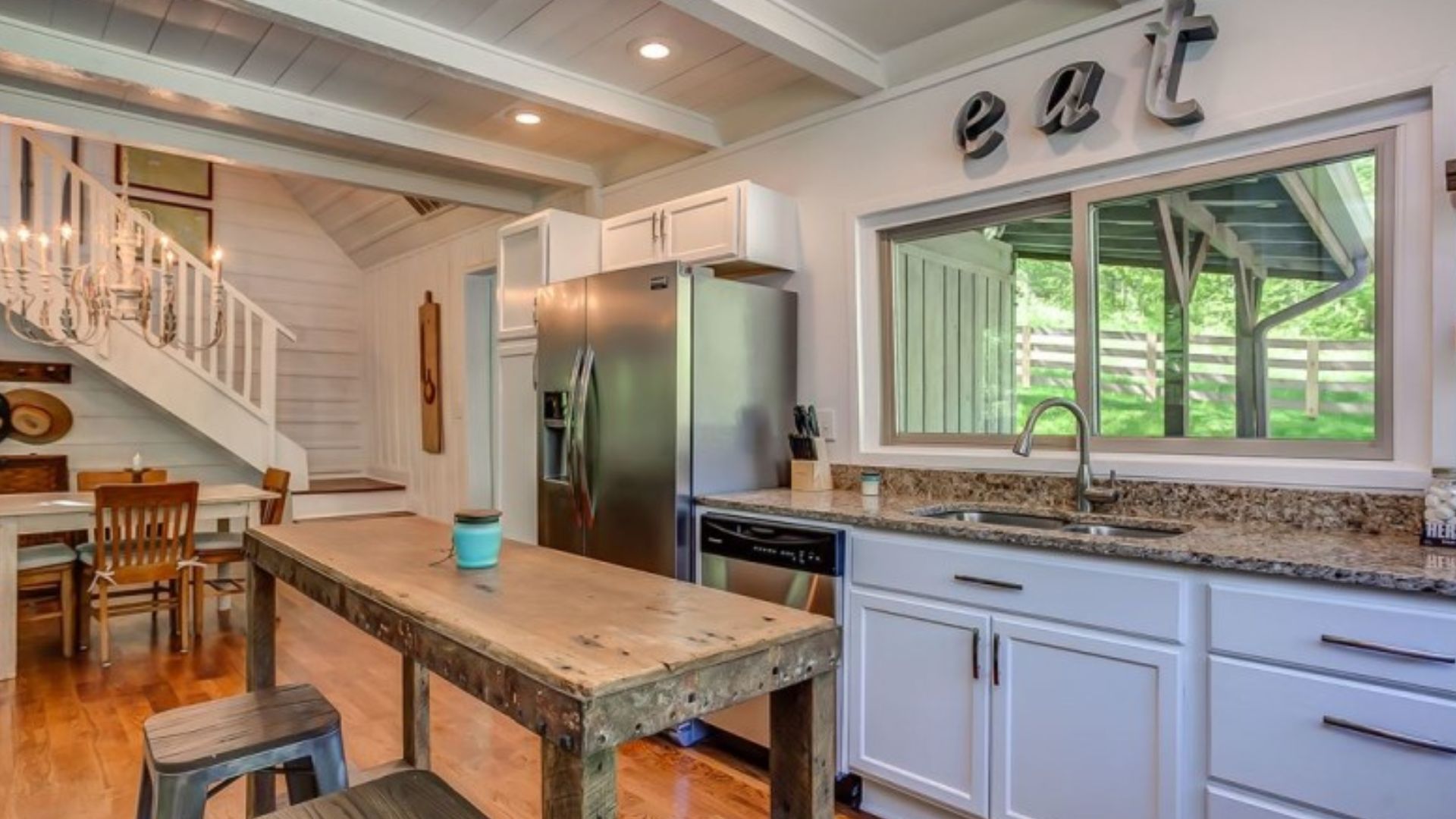 farmhouse style kitchen with a cool "eat" sign