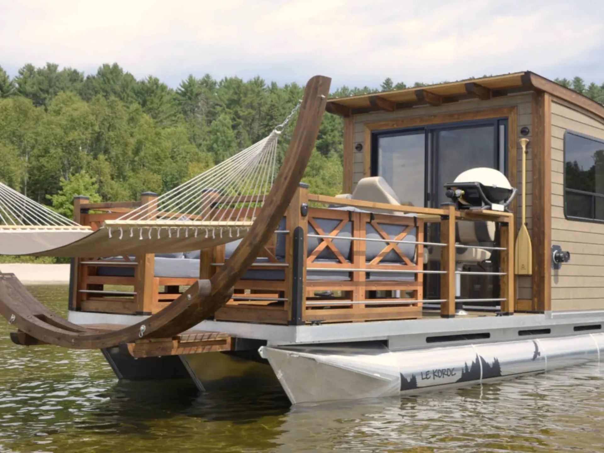 tiny boat home with a deck