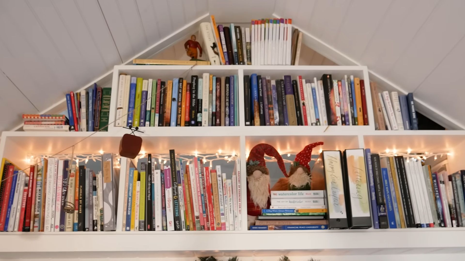 a-frame shelf with books