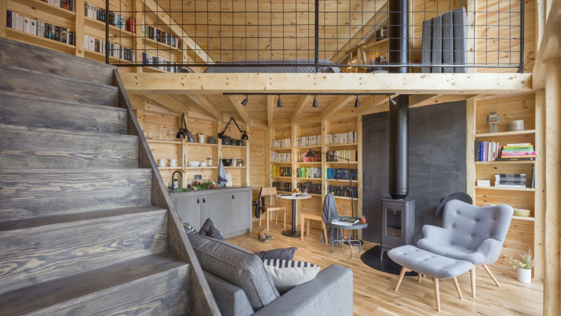 big, spacious living room with a library