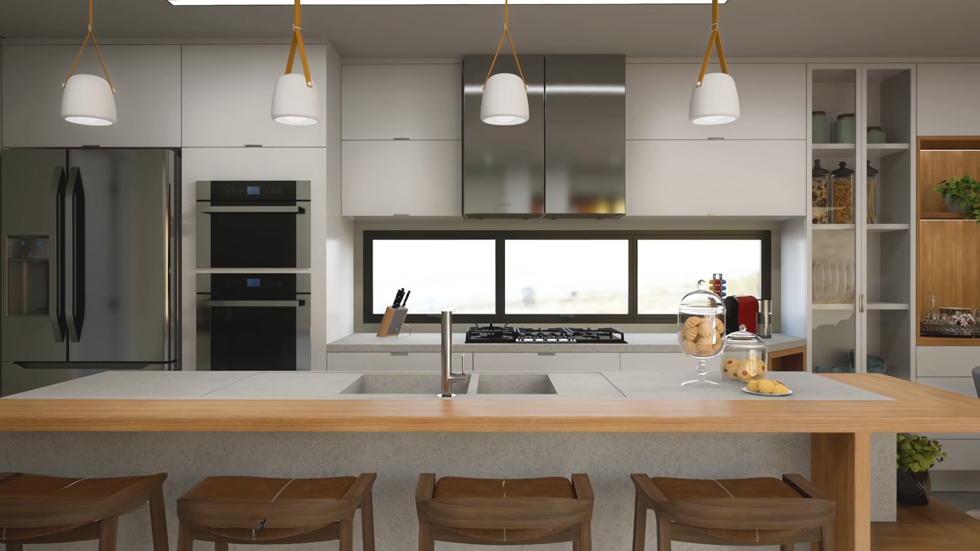 Stainless steal kitchen with an island and a window above the sink