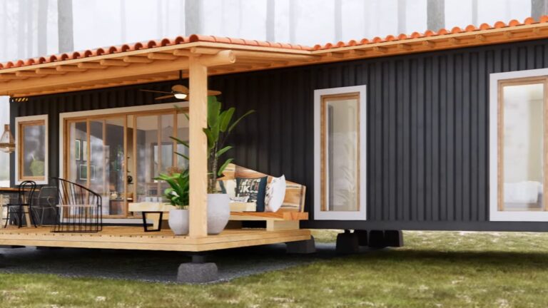 exterior of a shipping container with a black wall and a porch