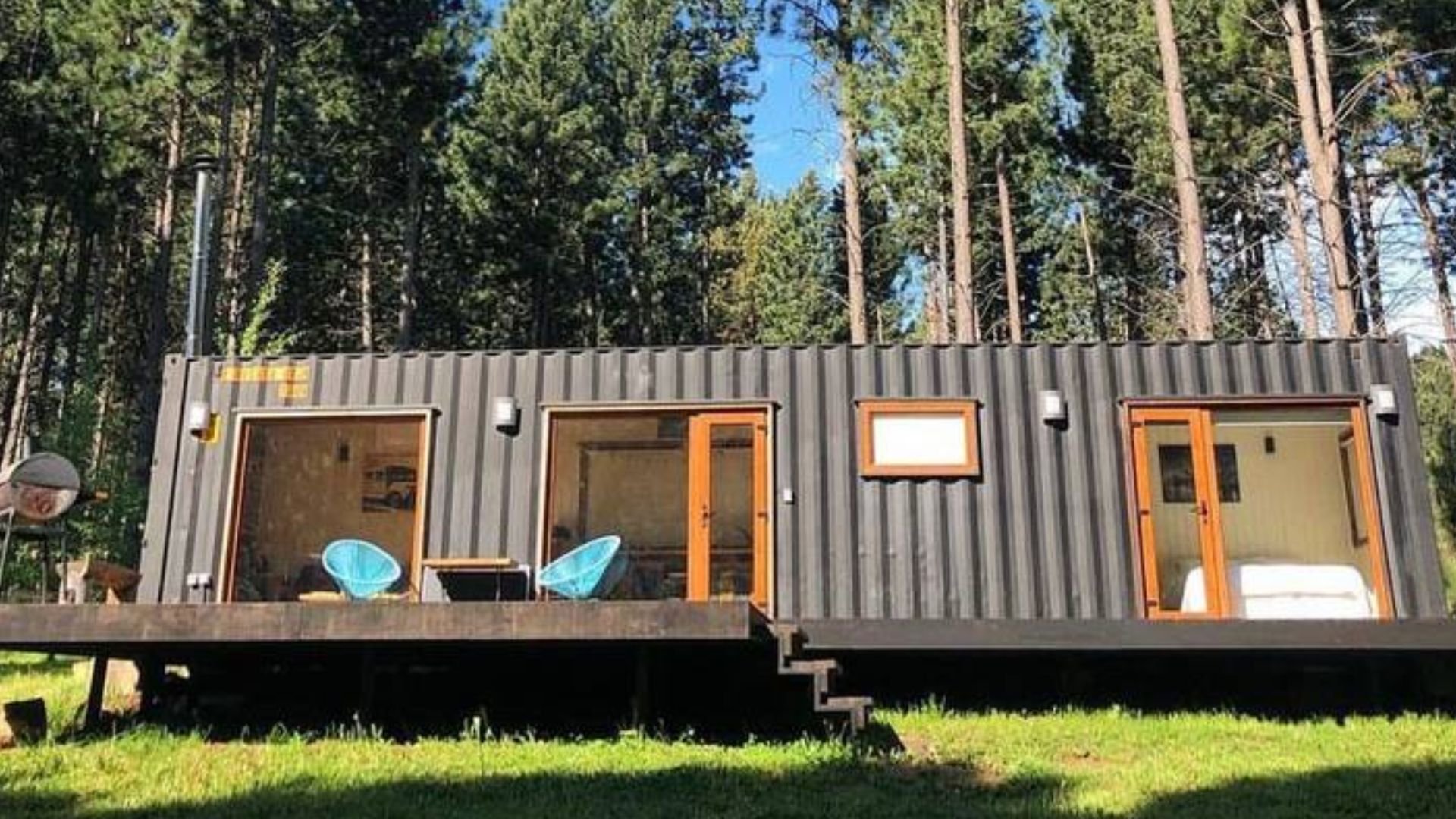 exterior of a container house in the woods