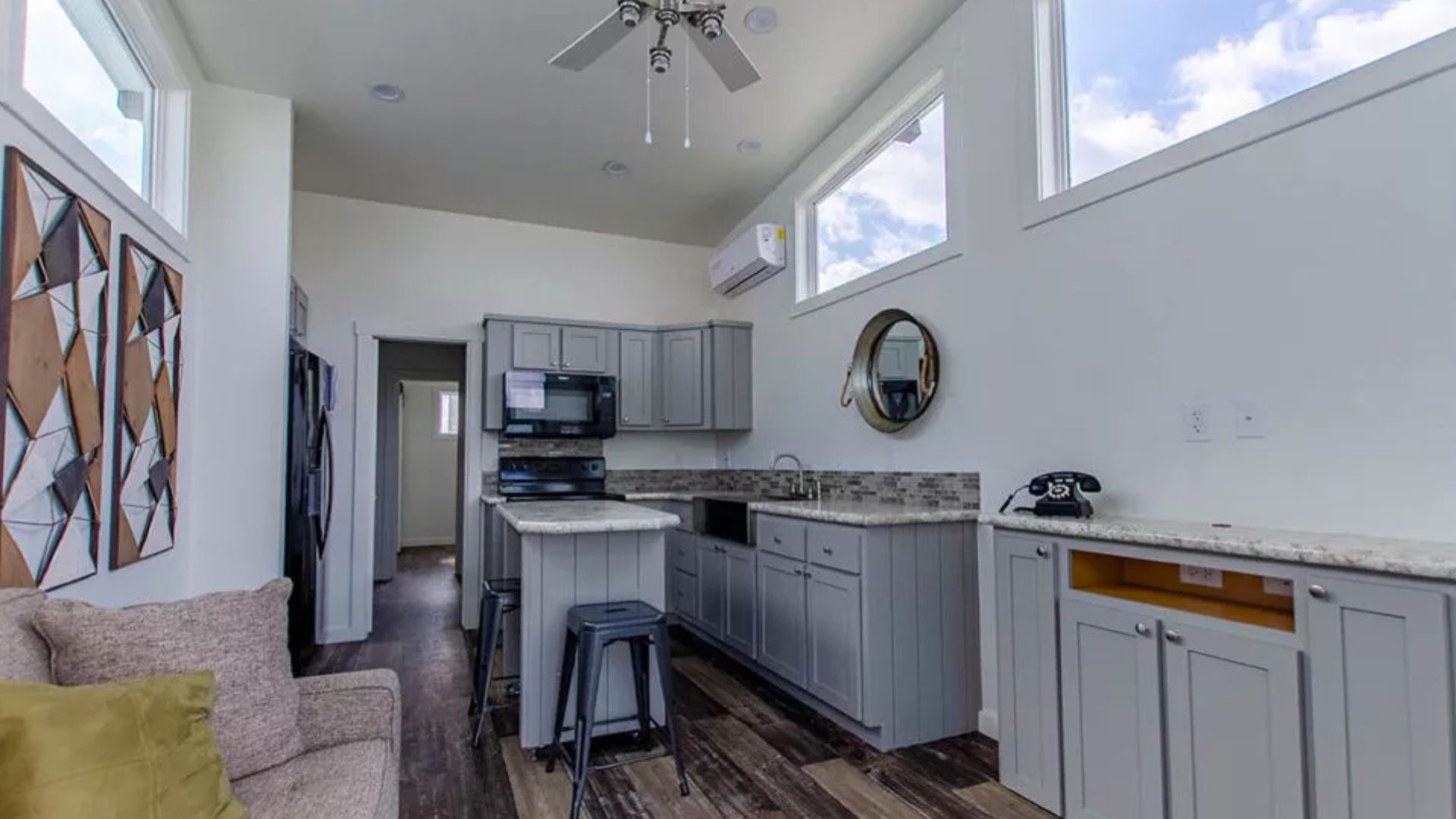 inside the tiny house with spacious kitchen and living room