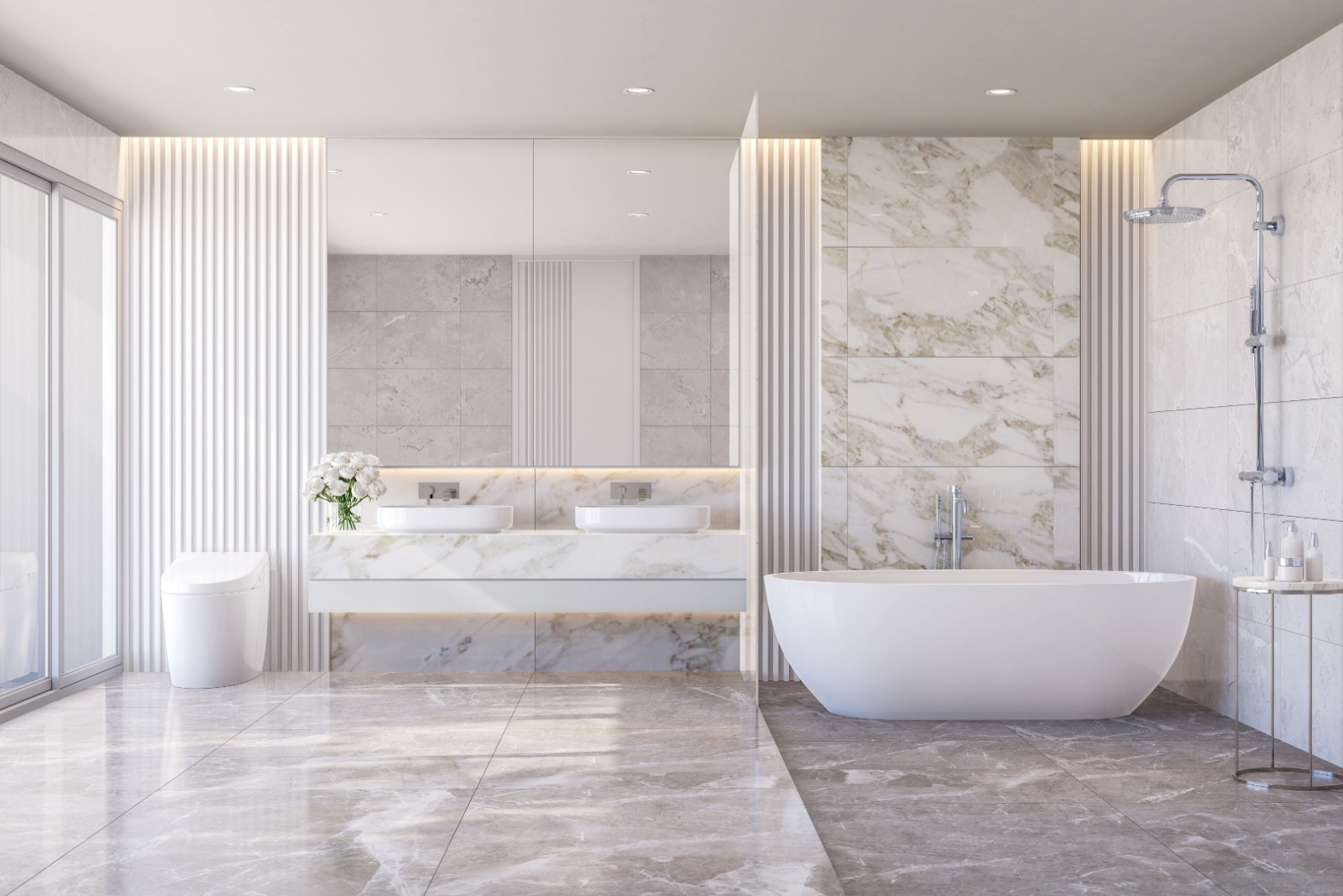 all white bathroom with a white bathtub, marble tiles, two white sinks, big mirror above the sinks